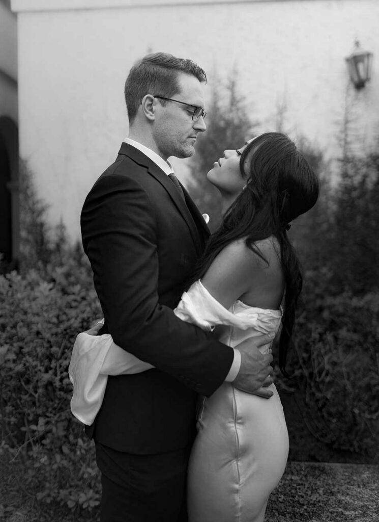 bride and groom embrace after small wedding in orlando fl