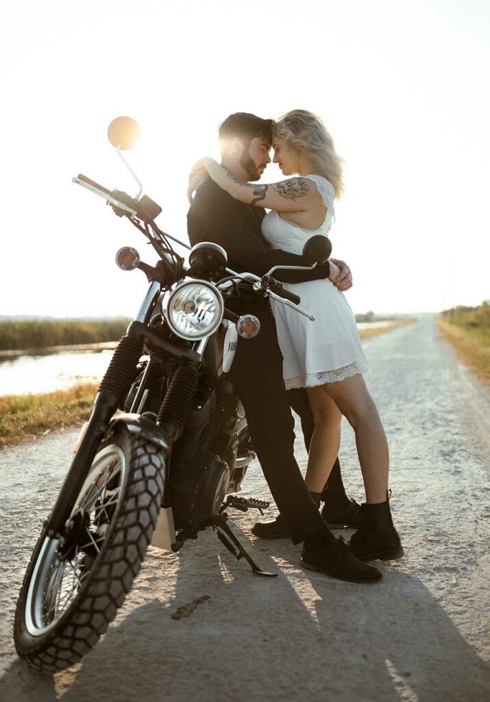 engagement photo with motorcycle loving couple